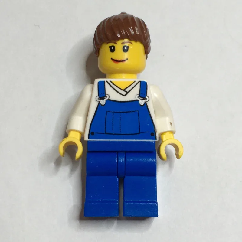 Woman, Blue Overalls over White V-Neck Shirt, Reddish Brown Hair