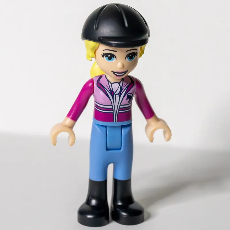 Stephanie - Dark Purple Top, Medium Blue Trousers, Black Cap