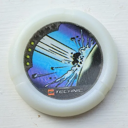 Large Figure Throwing Disk, Flare and Spark, 4 Pips, Meteor Impact Print