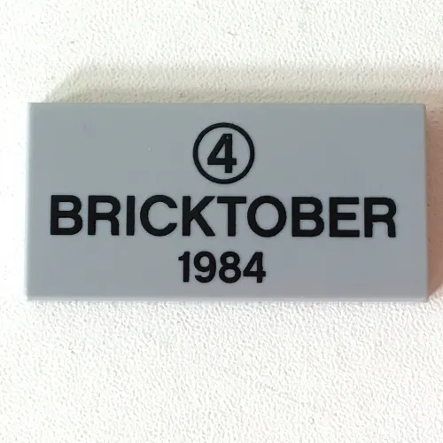 Tile 2 x 4 with Black '4' in Circle and 'BRICKTOBER 1984' Print