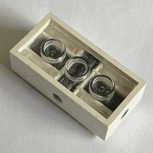 Brick Special 2 x 4 with Wheel Holder Old, Clear Bottom, Black Inside