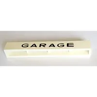 Brick 1 x 8 without Bottom Tubes with Cross Side Supports with 'GARAGE' Medium Sans-Serif Black Print