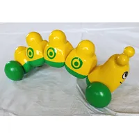 Primo Caterpillar with Green Wheels, Circles print