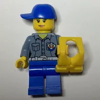 Coast Guard, Woman, Sand Blue Shirt with Badge, Blue Cap, Yellow Life Vest