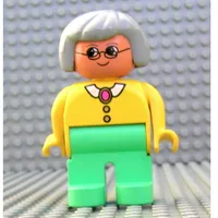 Duplo Figure, Early, Hair Bob Light Gray, Medium Green Legs, White Collar and Pink Pendant, Glasses Print